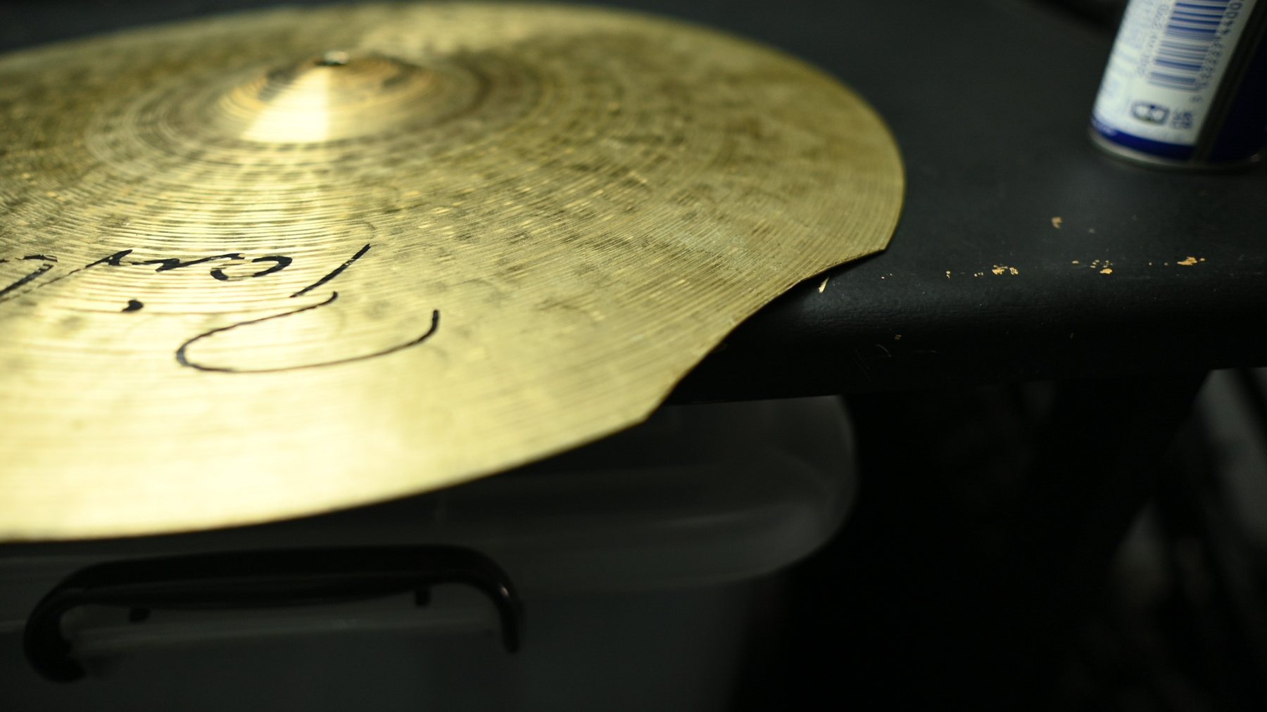 Repaired cymbal with damaged section carefully removed
