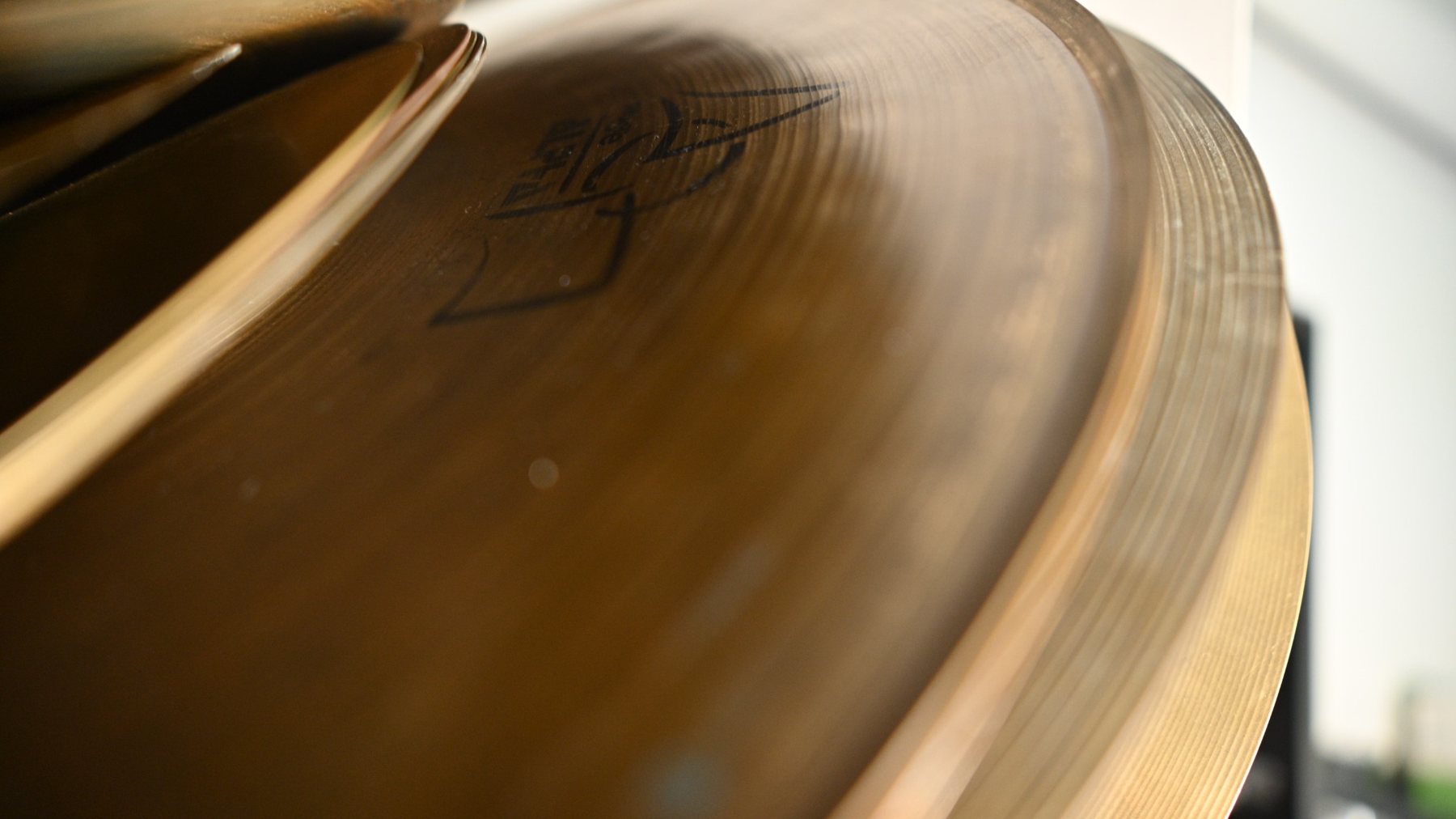 Close view of cymbal edges and bronze finish